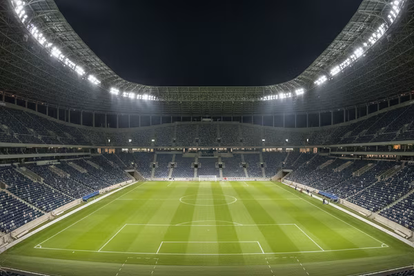 Stadium interior under floodlights
